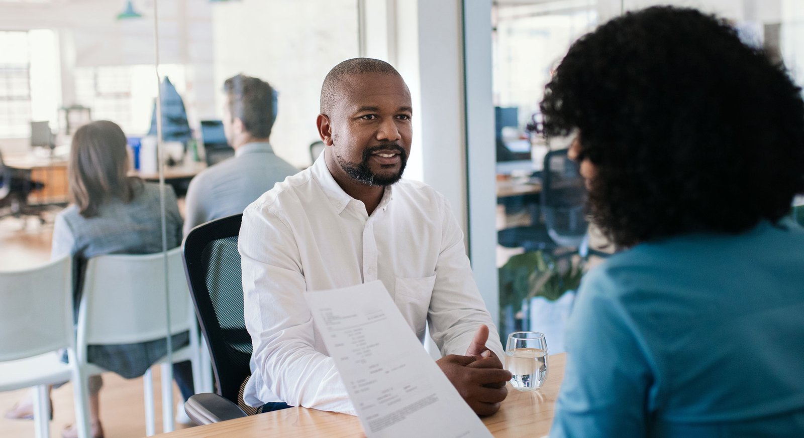 Smiling job applicant answering questions